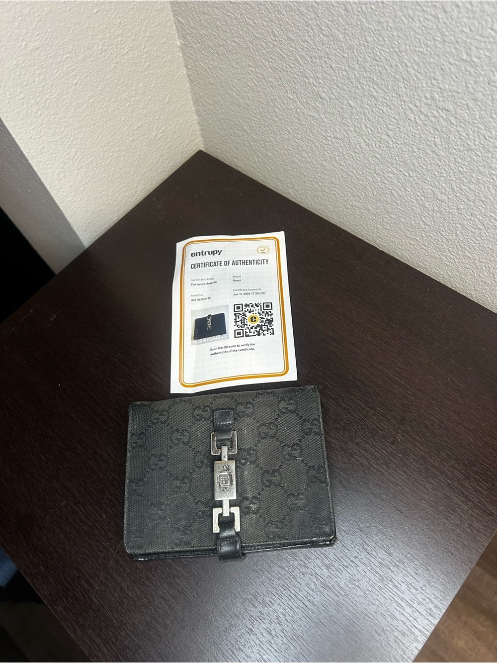 Gucci Dark Gray GG Canvas Jackie wallet with Silver-Tone lock Accent.